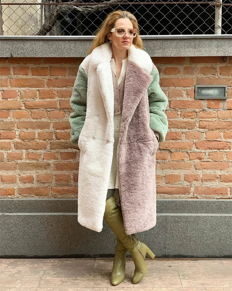 SONYA - Manteau en Fausse Fourrure Grande Taille Découvrez notre manteau SONYA, une création mode grande taille qui allie chaleur luxueuse et élégance française. Ce manteau en fausse fourrure grande taille offre un design chaleureux et sophistiqué, idéal