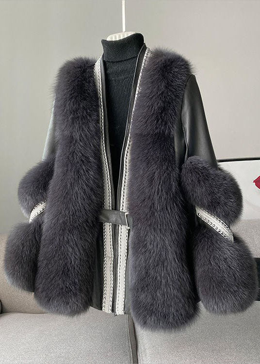 GENEVIVE - Manteau en Fausse Fourrure Patchwork Grande Taille Découvrez notre manteau GENEVIVE, une création mode grande taille qui allie luxe du patchwork en fausse fourrure et élégance française. Ce manteau grande taille au col V offre un design sophist
