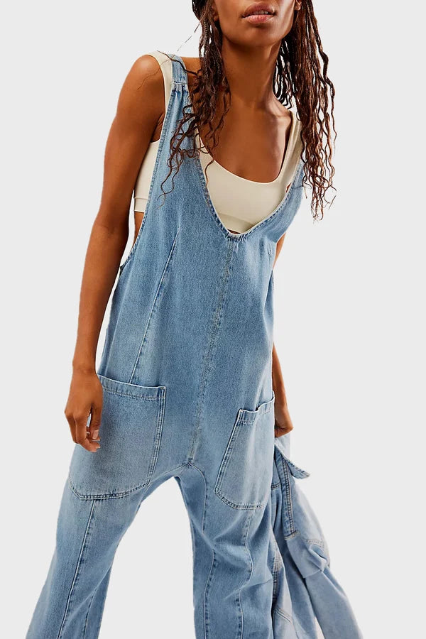 SHERICA - Salopette en Jean Grande Taille Découvrez notre salopette SHERICA, une création mode grande taille qui allie style denim décontracté et élégance française. Cette salopette en jean grande taille offre un design casual et tendance, idéale pour les