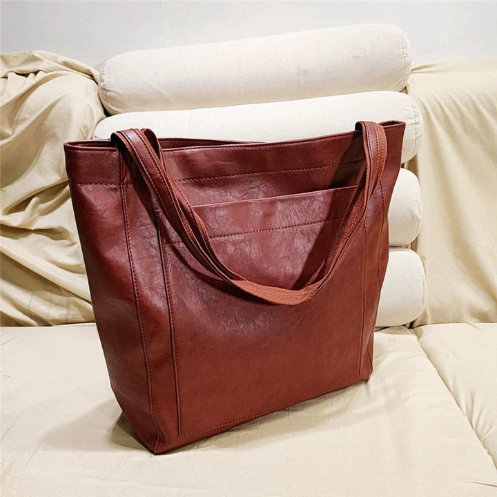 MADISON - Sac Fourre-Tout Élégant Grande Taille Découvrez notre sac MADISON, une création mode grande taille qui marie fonctionnalité durable et élégance française. Ce sac fourre-tout offre une silhouette raffinée et spacieuse, créé pour les femmes qui re