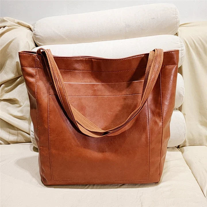 MADISON - Sac Fourre-Tout Élégant Grande Taille Découvrez notre sac MADISON, une création mode grande taille qui marie fonctionnalité durable et élégance française. Ce sac fourre-tout offre une silhouette raffinée et spacieuse, créé pour les femmes qui re
