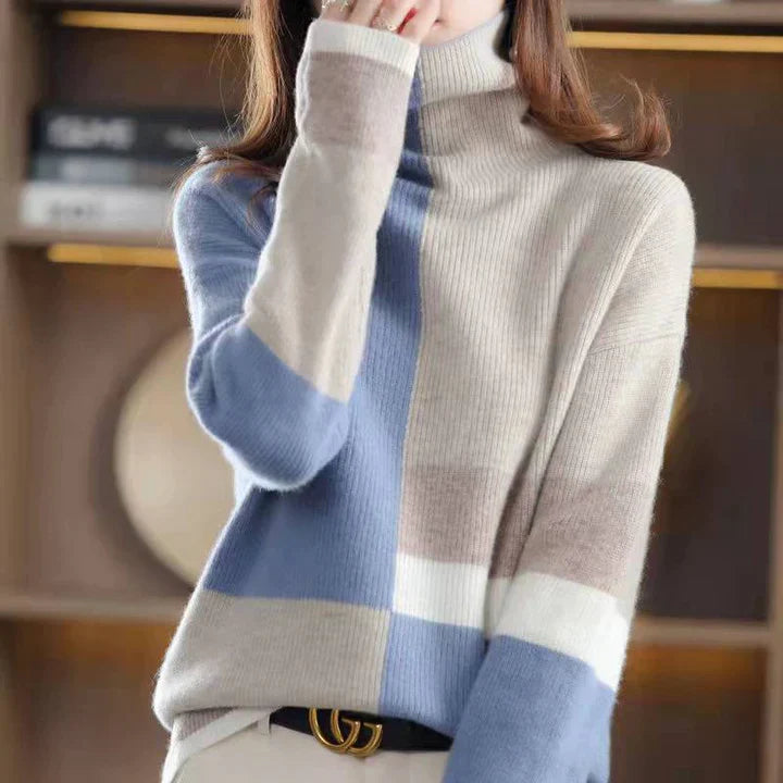 IDA - Pull Col Roulé Élégant d'Hiver Grande Taille Découvrez notre pull IDA, une création mode grande taille qui allie chaleur hivernale et élégance française. Ce pull col roulé grande taille offre une silhouette raffinée et confortable, créé pour les fem