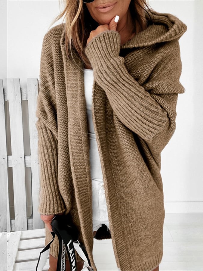 OLIV - Manteau Pull à Capuche Grande Taille Découvrez notre manteau-pull OLIV, une création mode grande taille qui allie confort décontracté et élégance française. Ce manteau à capuche grande taille offre un design hybride innovant, idéal pour les femmes
