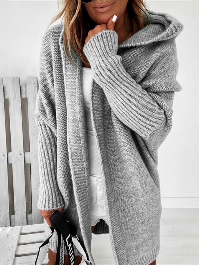 OLIV - Manteau Pull à Capuche Grande Taille Découvrez notre manteau-pull OLIV, une création mode grande taille qui allie confort décontracté et élégance française. Ce manteau à capuche grande taille offre un design hybride innovant, idéal pour les femmes