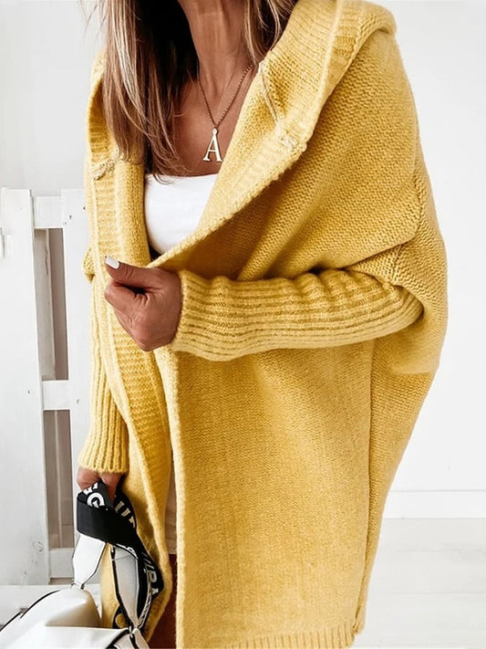 OLIV - Manteau Pull à Capuche Grande Taille Découvrez notre manteau-pull OLIV, une création mode grande taille qui allie confort décontracté et élégance française. Ce manteau à capuche grande taille offre un design hybride innovant, idéal pour les femmes