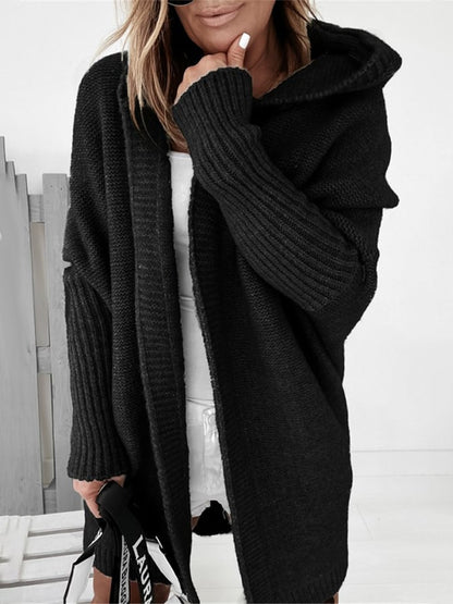 OLIV - Manteau Pull à Capuche Grande Taille Découvrez notre manteau-pull OLIV, une création mode grande taille qui allie confort décontracté et élégance française. Ce manteau à capuche grande taille offre un design hybride innovant, idéal pour les femmes