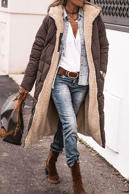 DARINA - Manteau Long Grande Taille Découvrez notre manteau DARINA, une création mode grande taille qui allie style intemporel et élégance française. Ce manteau long grande taille offre un design raffiné et moderne, idéal pour les femmes qui souhaitent un