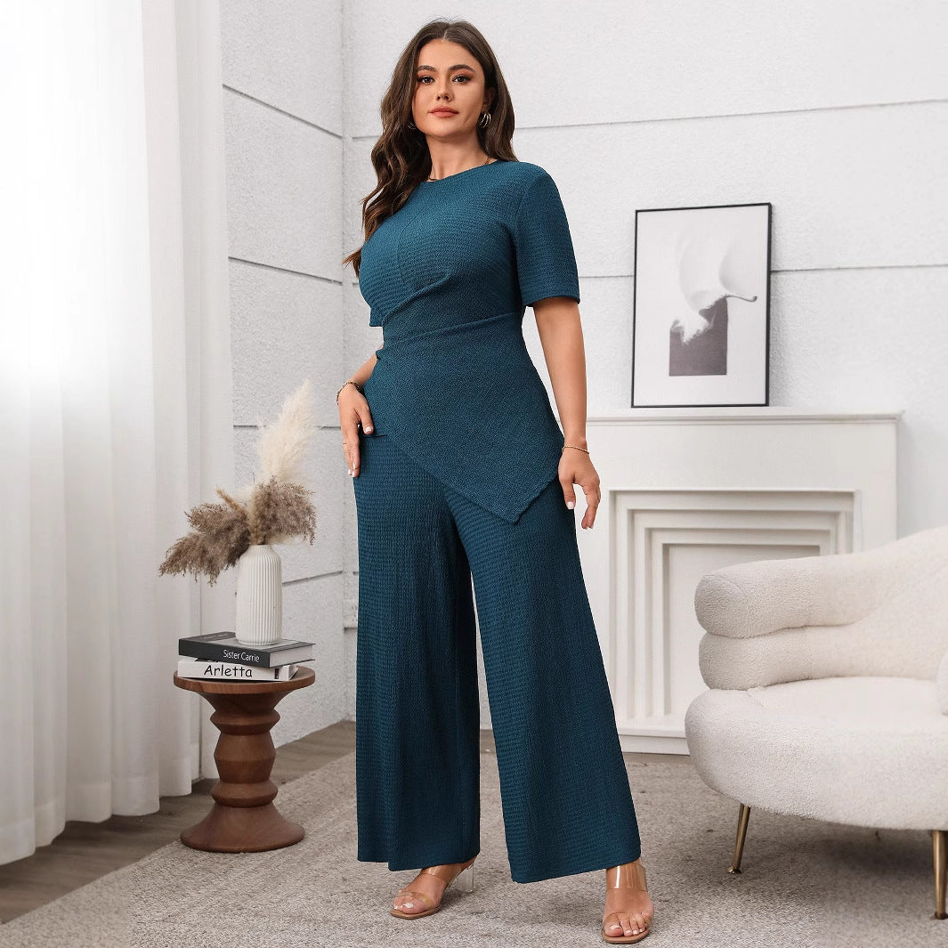 Claire Ensemble - Top & Pantalon Large Grande Taille Notre Claire Ensemble incarne l'élégance au quotidien. Cette combinaison deux pièces grande taille allie style contemporain et confort optimal, créant une silhouette moderne et raffinée qui vous accompa