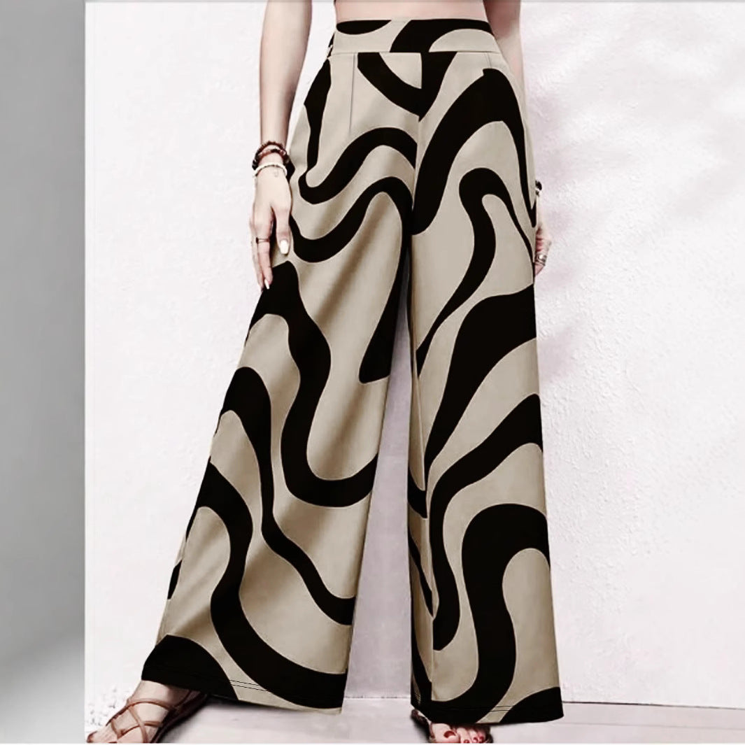Claire Ensemble Été Découvrez notre Pantalon Droit Rayé Grande Taille 'Céline' - Élégance et Confort au Quotidien 🌟 L'essentiel mode pour femmes aux belles courbes qui ne font aucun compromis sur le style. Caractéristiques Principales: • Coupe droite mod
