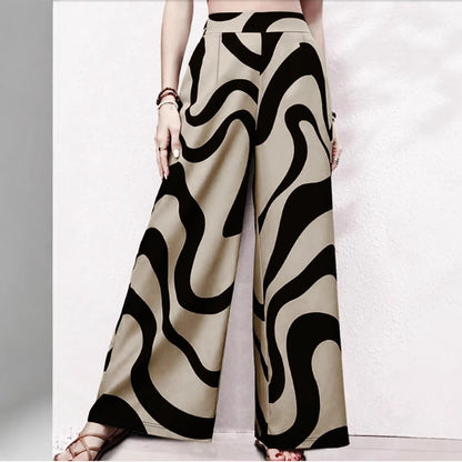 Claire Ensemble Été Découvrez notre Pantalon Droit Rayé Grande Taille 'Céline' - Élégance et Confort au Quotidien 🌟 L'essentiel mode pour femmes aux belles courbes qui ne font aucun compromis sur le style. Caractéristiques Principales: • Coupe droite mod