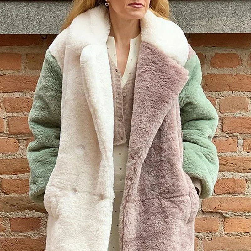 SONYA - Manteau en Fausse Fourrure Grande Taille Découvrez notre manteau SONYA, une création mode grande taille qui allie chaleur luxueuse et élégance française. Ce manteau en fausse fourrure grande taille offre un design chaleureux et sophistiqué, idéal