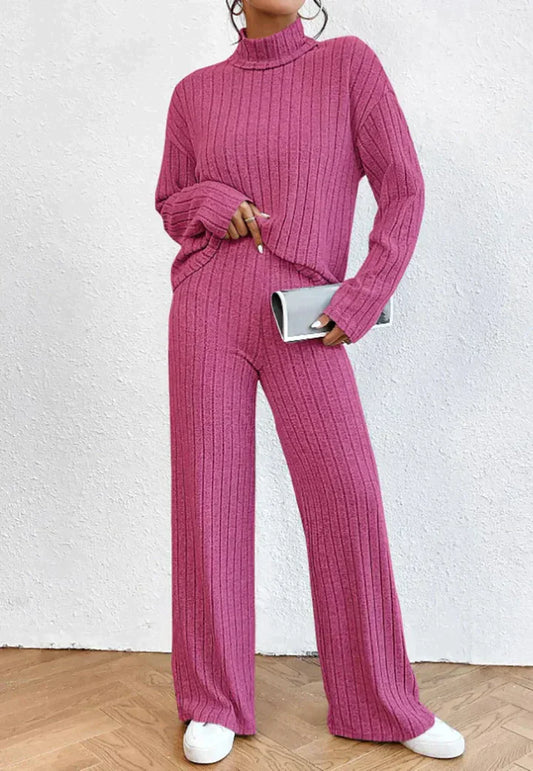 ALICE - Ensemble Pull Col Roulé et Pantalon en Maille Grande Taille Découvrez notre ensemble ALICE, une création mode grande taille qui allie le confort du tricot à l'élégance française. Cet ensemble coordonné grande taille comprend un pull col roulé raff
