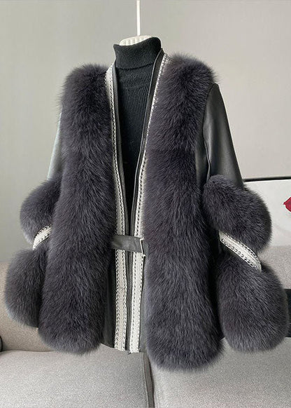 GENEVIVE - Manteau en Fausse Fourrure Patchwork Grande Taille Découvrez notre manteau GENEVIVE, une création mode grande taille qui allie luxe du patchwork en fausse fourrure et élégance française. Ce manteau grande taille au col V offre un design sophist