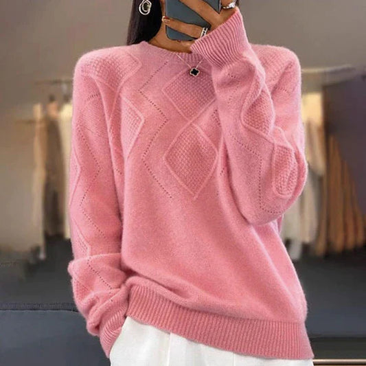 ARAH - Pull Rose Col Rond Élégant Grande Taille Découvrez notre pull ARAH, une création mode grande taille qui marie la douceur du rose à l'élégance française. Ce pull col rond grande taille offre une silhouette pure et raffinée, créé pour les femmes qui