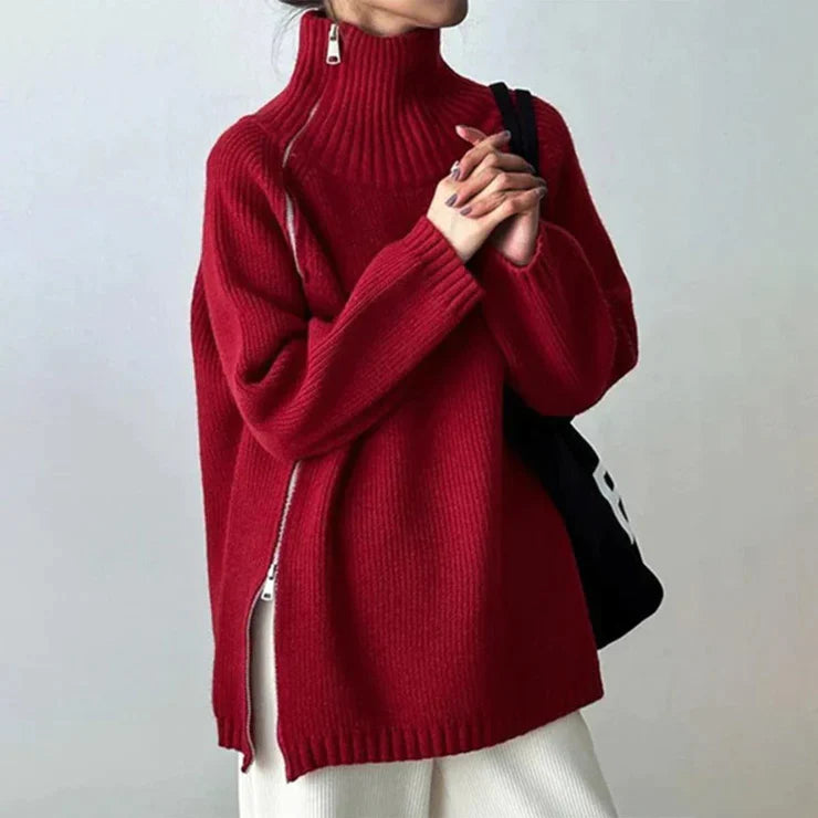 LAURA - Pull Col Montant Rouge Grande Taille Découvrez notre pull LAURA, une création mode grande taille qui marie l'éclat du rouge à l'élégance française. Ce pull col montant grande taille offre une silhouette raffinée et distinctive, créé pour les femme