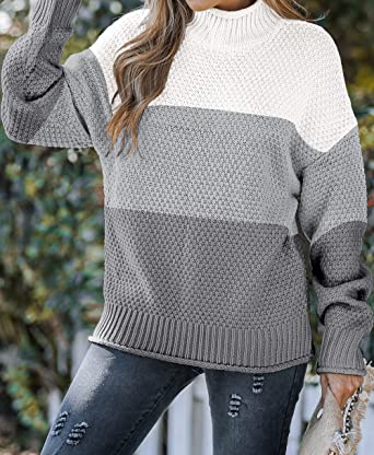 KENNEDY - Pull Rayé Élégant Grande Taille Découvrez notre pull KENNEDY, une création mode grande taille qui marie rayures sophistiquées et élégance française. Ce pull rayé grande taille offre une silhouette raffinée et graphique, créé pour les femmes qui