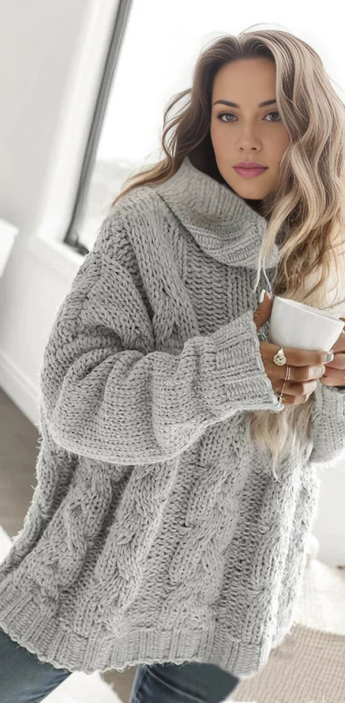 BETTY - Pull Oversize Col Haut Grande Taille Découvrez notre pull BETTY, une création mode grande taille qui allie coupe oversize tendance et élégance française. Ce pull col haut grande taille offre une silhouette contemporaine et raffinée, créé pour les