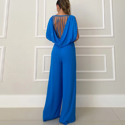 ROSY - Combinaison d'Été Grande Taille Découvrez notre combinaison ROSY, une création mode grande taille qui allie fraîcheur estivale et élégance française. Cette combinaison d'été grande taille offre un design léger et tendance, idéale pour les femmes qu