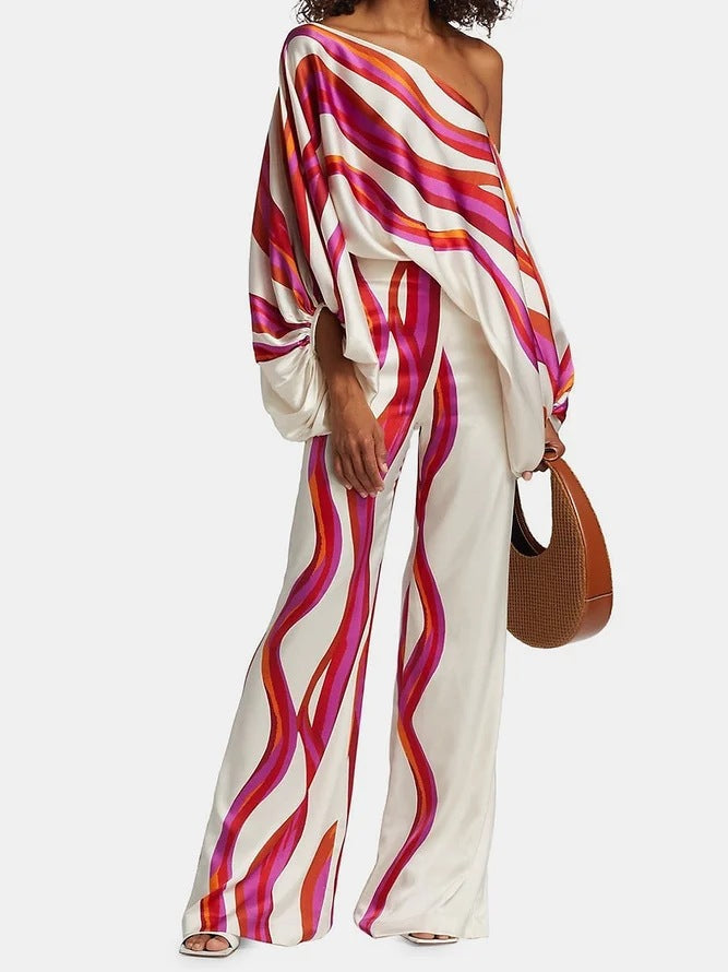 CHICA - Ensemble 2 Pièces Grande Taille Découvrez notre ensemble CHICA, une création mode grande taille qui allie sophistication et élégance française. Cet ensemble élégant grande taille offre un style raffiné et moderne, idéal pour les femmes qui souhait