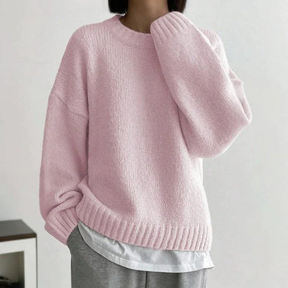 RINA - Pull Rose Col Rond Élégant Grande Taille Découvrez notre pull RINA, une création mode grande taille qui marie la douceur du rose à l'élégance française. Ce pull col rond grande taille offre une silhouette pure et raffinée, créé pour les femmes qui